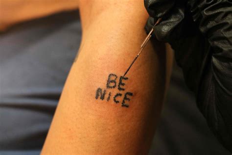 stick and poke tattoo with tattoo needle